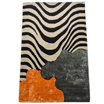 A contemporary area rug featuring sleek stripes and abstract patterns in black, white, orange, and grey. This tufted wool rug is perfect for adding a modern touch to a dining room or office space.