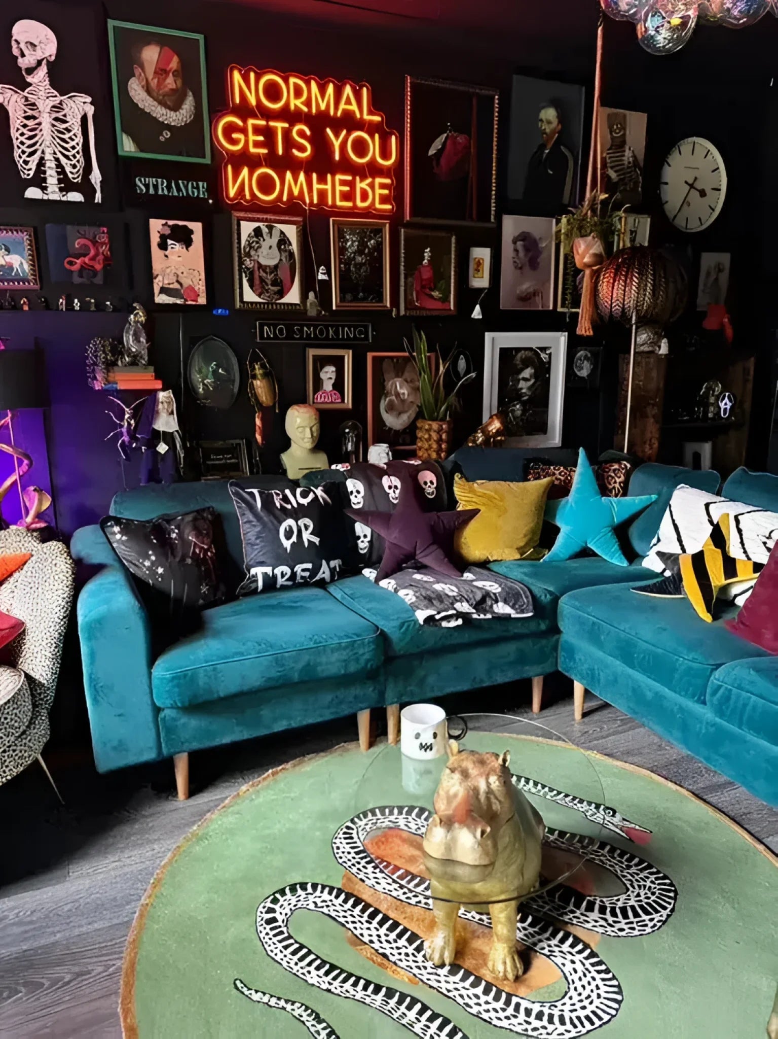A vibrant living room featuring a round wool rug with a snake and apple design, ideal for adding a unique touch to a dining room. This large area rug complements the eclectic decor, including teal sofas and colorful cushions, creating a bold statement in formal dining room settings.