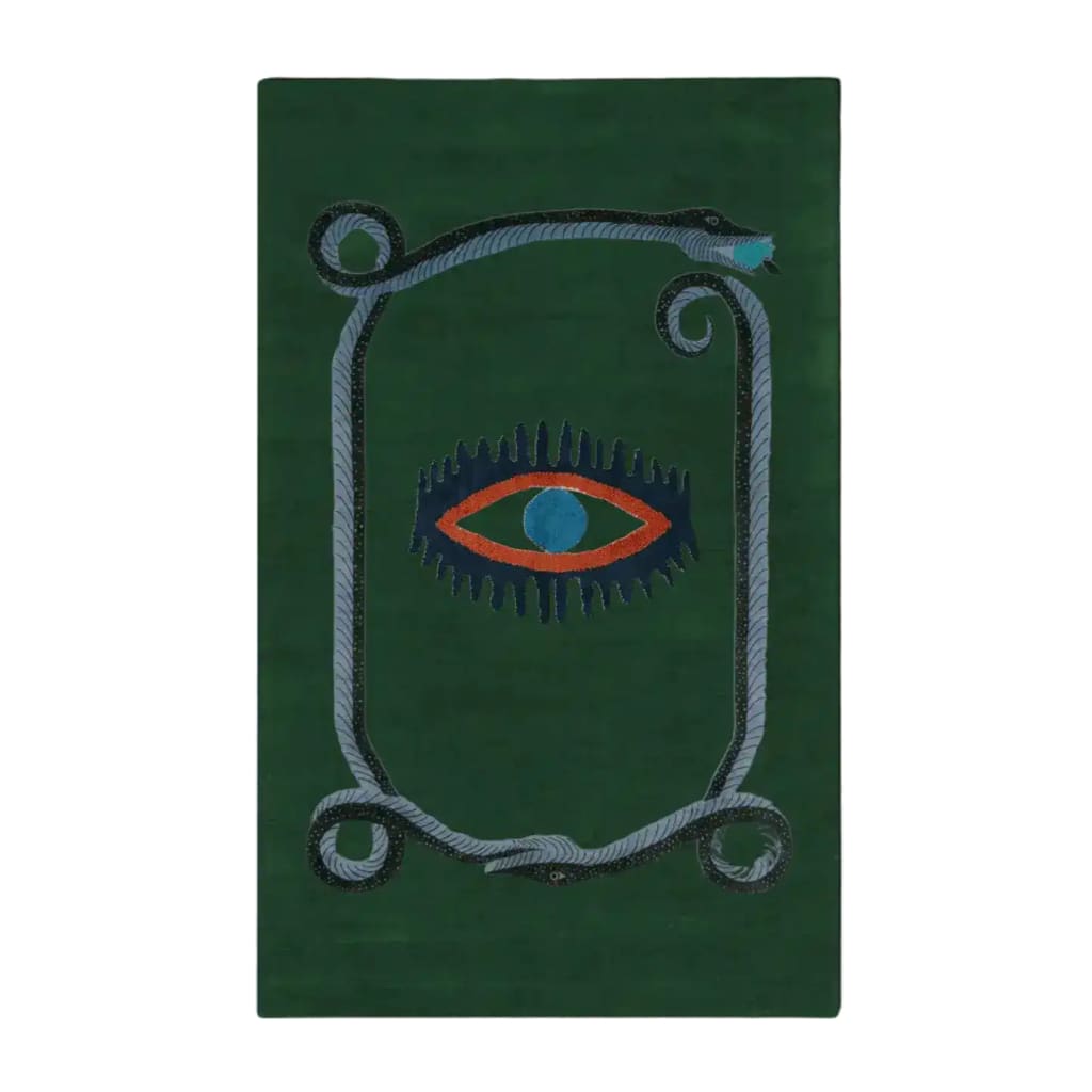 A striking green wool area rug featuring a unique design with a central red and blue eye motif, bordered by a snake pattern. This hand-tufted vintage rug is perfect for adding an artistic touch to your dining room, kitchen, or hallway. Ideal as a kitchen runner rug or bathroom runner rug, it complements formal dining room settings and adds warmth and style to any space.