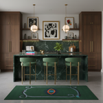 Modern kitchen with green marble island and bar stools, featuring abstract art on the wall.