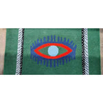 This vibrant area rug features a striking design with a central motif of red evil eyes and blue accents set against a green background. Perfect for adding a bold touch to dining room areas, kitchens, or hallways, this hand-tufted wool rug combines vintage charm with modern aesthetics. Ideal as a kitchen runner rug or a hallway runner rug, it brings a unique flair to any space.