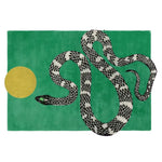 This vibrant green area rug features a striking design of a black and white snake coiled next to a yellow sun. Perfect for adding a contemporary touch to your dining room or office space, this hand-tufted wool rug combines artistry with comfort, making it an ideal choice for both dining table rugs and rugs for office settings.