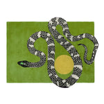 This image features the Snake and Sun Hand Tufted Wool Rug in Moss Green, showcasing a striking black and white snake design set against a vibrant green backdrop. Perfect for adding a touch of contemporary style to your living room, this large area rug measures 8x10 and is ideal for those seeking unique and artistic living room rugs.