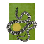 The "3D Snake Hand Tufted Wool Rug 5' x 8'" showcases a captivating 3D snake design, creating a bold and artistic statement in any room. Crafted from high-quality wool, this rug offers both texture and durability for a unique decor piece.