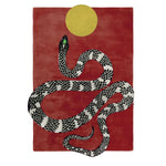 A striking area rug featuring a bold, hand-tufted wool design with a black and white snake against a deep red background, topped with a golden sun. Perfect for adding a contemporary touch to your living room, this 8x10 rug makes a statement as a centerpiece in modern living spaces.