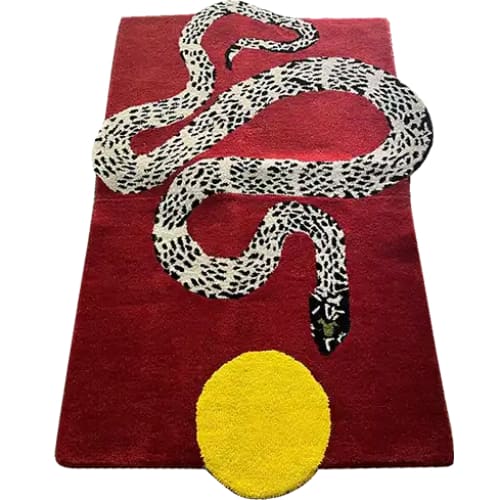 Contemporary wool area rug featuring a striking snake and sun design on a deep red background, perfect for adding a bold statement to your living room. This 8x10 hand-tufted rug combines artistry and function, ideal for those seeking unique living room rugs.