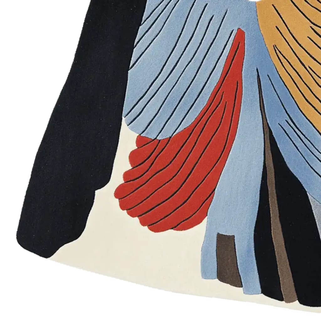 Close-up of the Soaring Shape Symphony Hand Tufted Area Rug, showcasing its contemporary design with bold, abstract patterns in red, blue, and black. This wool rug is perfect for adding a modern touch to living rooms, especially in an 8x10 size. Ideal for those seeking unique area rugs for living room decor.