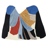 Top view of the Soaring Shape Symphony Hand Tufted Rug, an abstract area rug with a contemporary design. The wool rug features a vibrant mix of blue, red, mustard, and black hues, making it an ideal choice for living room rugs sized 8x10. This piece adds a modern touch to area rugs for living room settings.