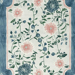 This area rug features a beautiful floral design with intricate patterns of pink and blue flowers on a cream background, bordered by a subtle blue edge. Made from high-quality wool, this large living room rug adds a touch of elegance and warmth to any space.