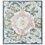 Top view of the Soft Bloom Rhapsody Hand Tufted Area Rug, showcasing an elegant floral design. This wool rug features soft pastel hues with intricate floral patterns, making it a perfect centerpiece for living room rugs 8x10.