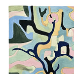 Top view of a Soft Form Abstraction Hand Tufted Area Rug, featuring a colorful contemporary design. This large wool rug showcases an abstract pattern with pastel hues, perfect for adding a touch of modern elegance to your living room.