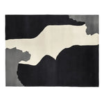 A contemporary area rug with a striking abstract design in shades of black, white, and gray, perfect for modern living rooms. This wool rug, sized 8x10, adds a bold artistic touch to any space, making it an ideal choice for those seeking stylish rugs for living rooms.