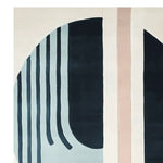 A contemporary area rug featuring an abstract design with curved and straight lines in shades of blue, black, and beige. Ideal for modern living room spaces, this wool rug adds a stylish touch to any decor.