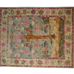 The Soft Harmony Tapestry Hand Knotted Area Rug showcases an intricate design, perfect for enhancing living room spaces. This floral rug features a blend of vibrant colors and detailed patterns reminiscent of traditional Persian rugs, creating a harmonious and elegant look.