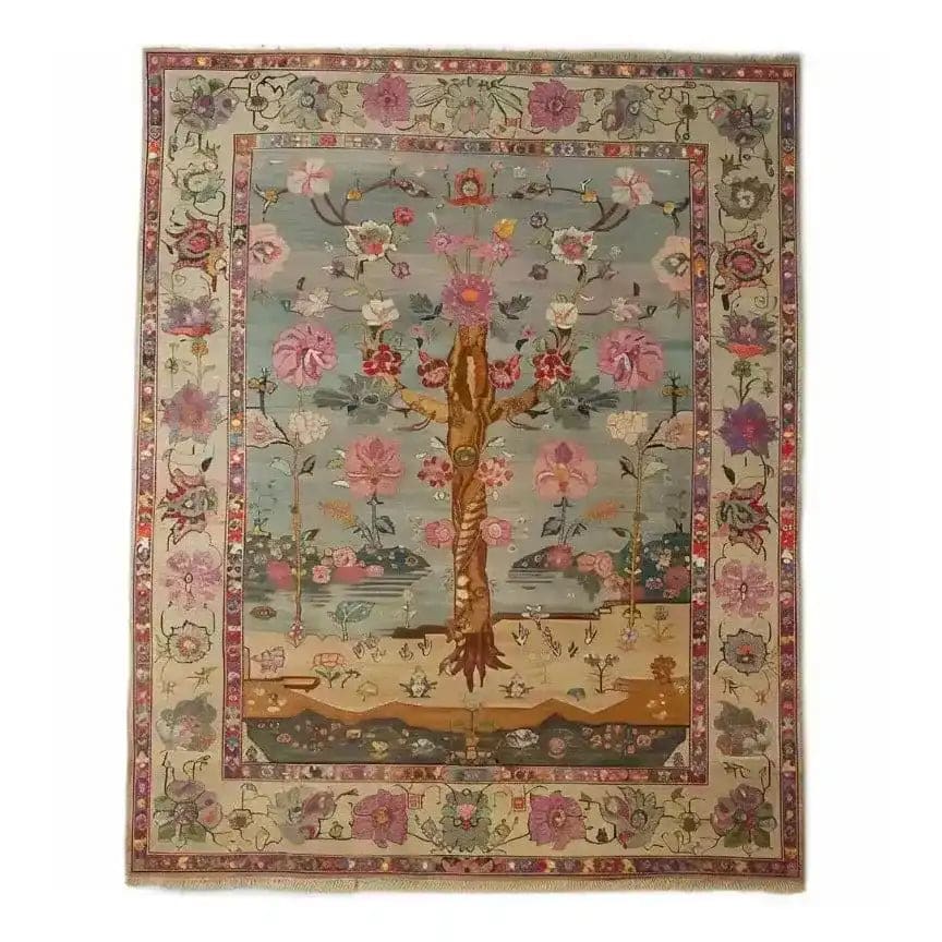 The Soft Harmony Tapestry Hand Knotted Area Rug showcases an intricate floral design reminiscent of classic Persian rugs. Its vibrant tapestry of flowers and nature-inspired patterns adds a touch of elegance to living room area rugs, creating a harmonious and inviting atmosphere.