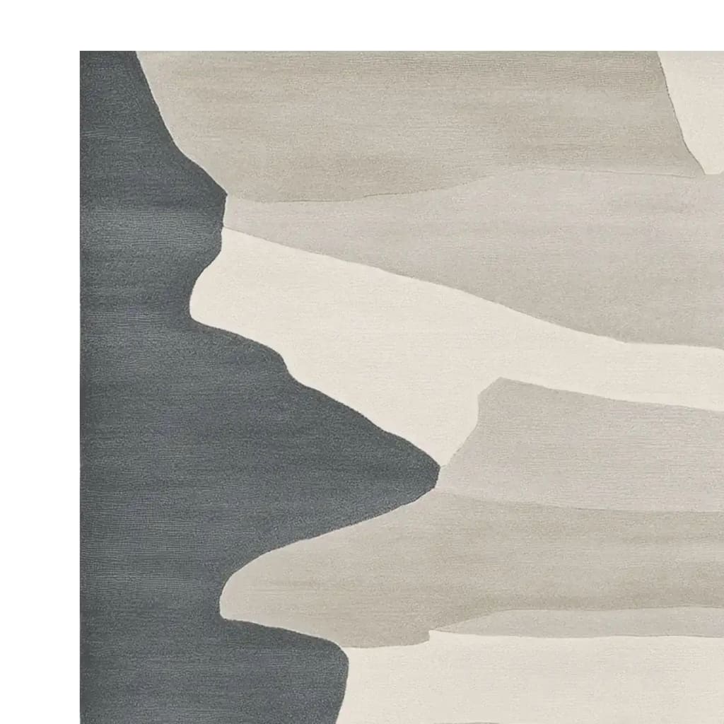 This area rug features a contemporary design with abstract shapes in shades of grey and cream, perfect for modern living rooms. Made from high-quality wool, this 8x10 rug adds a touch of elegance to any large living room space.