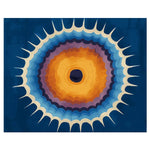 A vibrant Solar Bloom Hand Knotted Area Rug featuring an abstract sunburst design in rich blues, oranges, and purples. This contemporary wool rug is perfect for adding a splash of color to living room spaces, making it an ideal choice for those seeking unique living room area rugs.