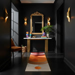 Solar Eclipse runner in a dark hallway, warm sunset arcs in orange and cream with an orange dot