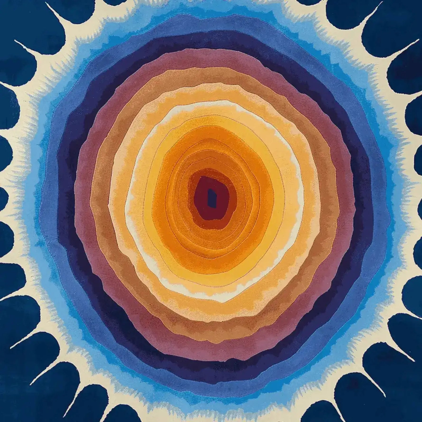 Vibrant Solar Flare Bloom Hand Tufted Area Rug featuring a mesmerizing abstract design with concentric circles in shades of orange, blue, and purple. This contemporary wool rug adds a pop of color to any living room, perfectly sized at 8x10 for modern interiors, making it an ideal choice for area rugs for living rooms.