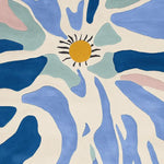 A vibrant area rug featuring an abstract design with flowing blue, teal, and pink shapes radiating from a central yellow sun. This contemporary wool rug is perfect for adding a splash of color to any living room.