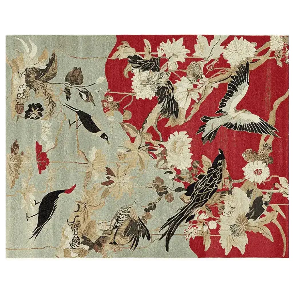 A beautifully crafted area rug titled 'Song of the Skies Hand Tufted Rug' showcasing a vibrant design with birds and floral patterns. This wool rug is perfect for adding a touch of elegance to any living room. The large living room rug features a striking contrast of red and muted tones, ideal for those seeking unique rugs for living room decor.