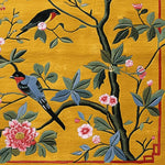 A vibrant area rug featuring an intricate design of songbirds perched on blooming branches set against a rich golden background. This contemporary wool rug, ideal for adding a touch of nature to your decor, is perfect for living rooms. Available in an 8x10 size, it combines elegance and comfort, making it a standout choice among living room rugs.