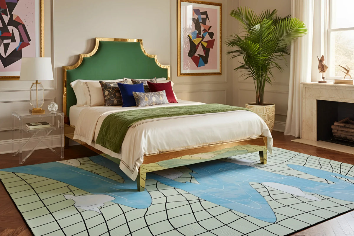 Decorative bedroom with a green upholstered headboard, colorful pillows, and a contemporary wool rug.