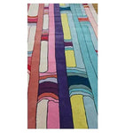 Vibrant Spectrum Stripe Hand Tufted Area Rug with bold, colorful stripes in an abstract pattern, ideal for contemporary living rooms. This wool rug is a perfect choice for those seeking large living room rugs, offering an 8x10 size that enhances your space with its modern design.