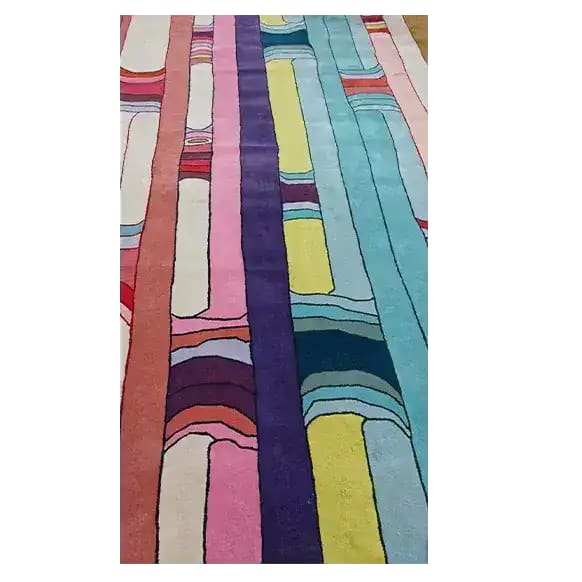 Vibrant Spectrum Stripe Hand Tufted Area Rug with bold, colorful stripes in an abstract pattern, ideal for contemporary living rooms. This wool rug is a perfect choice for those seeking large living room rugs, offering an 8x10 size that enhances your space with its modern design.