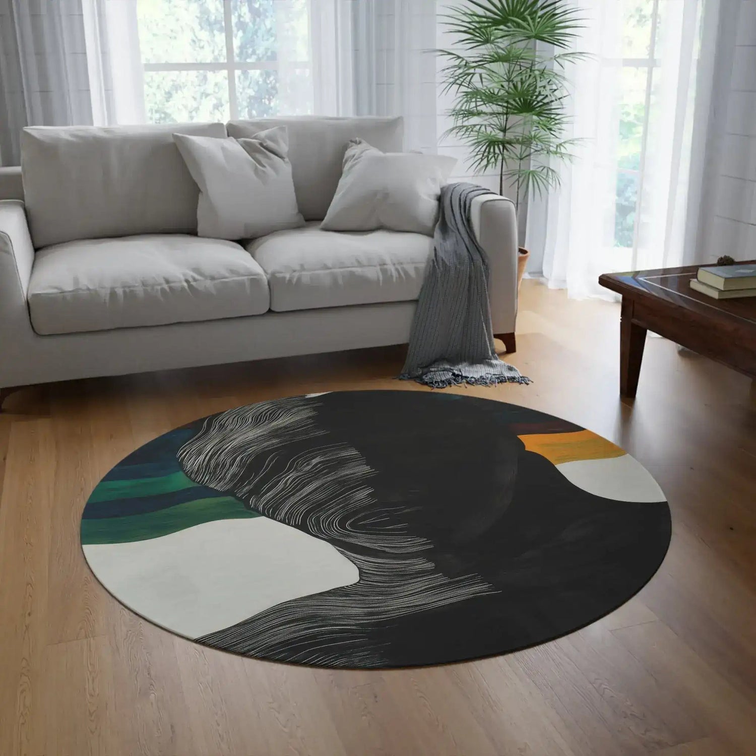 Split Spectrum Round Rug in a styled interior with warm-toned furniture, abstract split-face portrait design visible