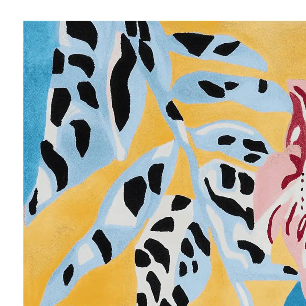 Close-up of the Spotted Petal Paradise Hand Tufted Area Rug, showcasing a contemporary design with bold abstract patterns in blue, yellow, black, and pink. This wool rug is perfect for adding a vibrant touch to living room area rugs, especially in an 8x10 size.