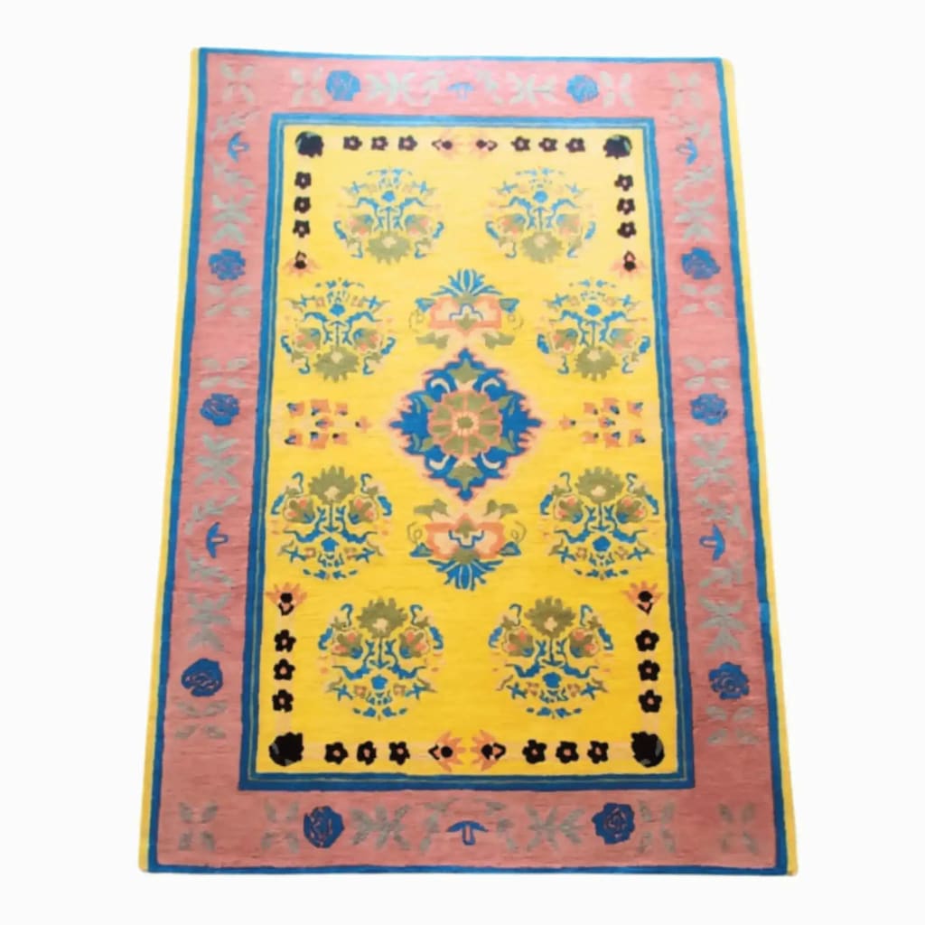 Top view of the Spring Blossom Traditional Hand Tufted Rug, measuring 5 x 7.5 ft. This wool rug features a vibrant floral pattern with bold colors, perfect for adding a touch of boho style to your living room. Ideal as a centerpiece in large area rugs collections, it complements the aesthetics of living room rugs 8x10.