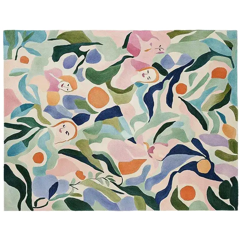 A vibrant Spring Canopy Hand Tufted Area Rug featuring an abstract floral design with pastel tones of pink, blue, green, and orange. This contemporary wool rug is perfect for adding a splash of color to any living room.