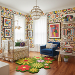 Colorful nursery with geometric wall patterns, floral rug, and blue armchair.