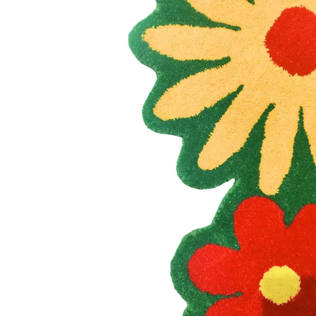 Close-up view of a vibrant wool rug designed with bold spring flowers in a green field, perfect for adding a splash of color to any office space.