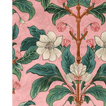 A beautifully detailed area rug featuring a vibrant floral design with large green leaves and white blossoms set against a soft pink background. Perfect for adding a touch of nature to your living room, this wool rug brings both elegance and comfort to any space.