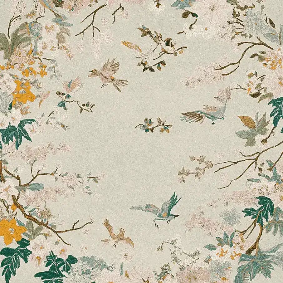 A beautifully designed area rug featuring a spring garden theme with birds and floral patterns, crafted from high-quality wool. This elegant rug is perfect for adding a touch of nature to your living room decor, making it an ideal choice for those seeking wool rugs and area rugs for living rooms.