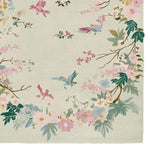 Beautifully designed area rug featuring a hand-tufted wool pattern with vibrant birds and flowers, ideal for adding a touch of nature to your living room. This exquisite wool rug showcases an intricate spring garden design, perfect for those seeking elegant area rugs for living room spaces.