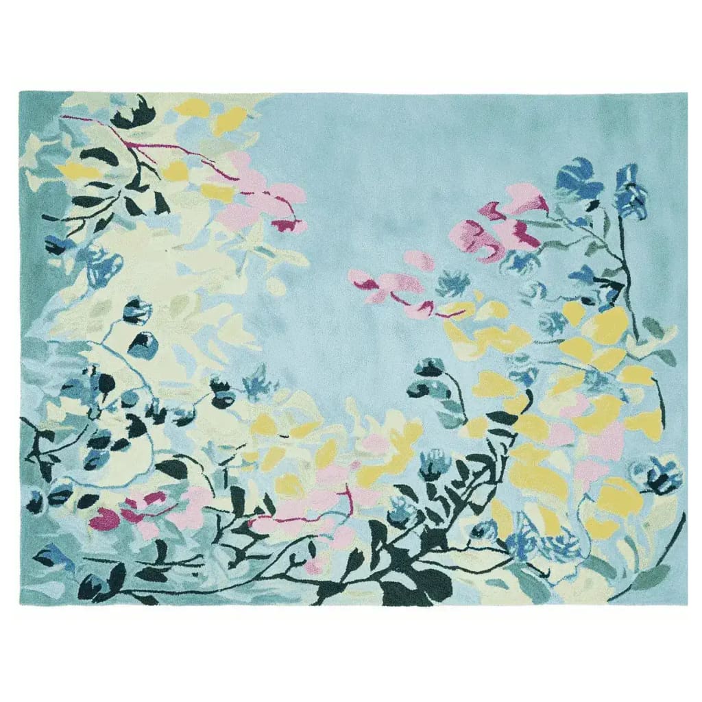 This image showcases the 'Spring Garden Whisper Hand Tufted Rug', a beautifully designed area rug perfect for contemporary living spaces. The wool rug features a lush floral pattern in pastel shades of yellow, pink, and blue against a soft background, making it an ideal choice for living room rugs 8x10. This elegant piece brings a touch of nature and style to any room, enhancing your home decor with its artistic design.