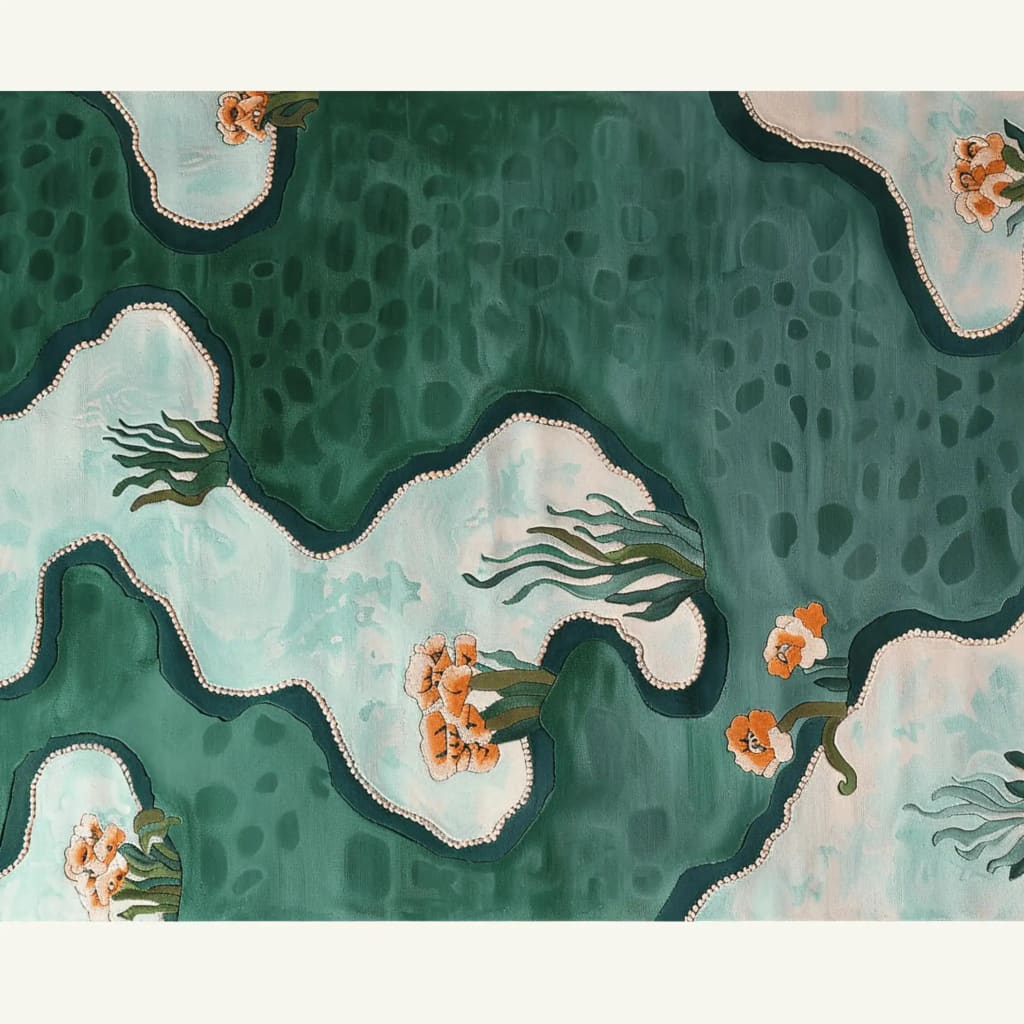 The Springtime Reflections Hand Tufted Area Rug features an abstract design with flowing green and cream patterns, accented by delicate orange floral motifs. This contemporary wool rug in an 8x10 size adds a fresh and artistic touch to large living rooms, perfect for those seeking a unique and stylish large area rug.