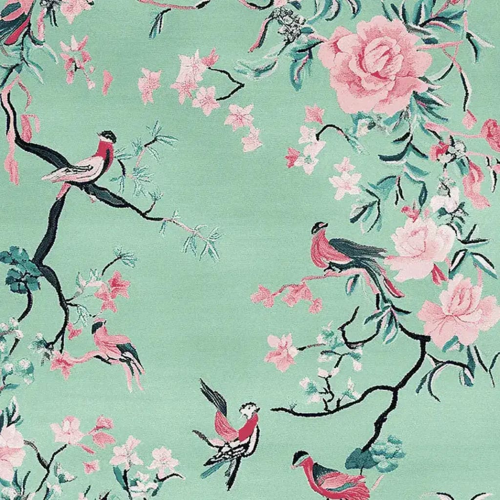 A beautifully hand-tufted area rug showcasing a vibrant springtime scene with birds and flowers. This wool rug is perfect for adding a touch of nature to your living room decor.