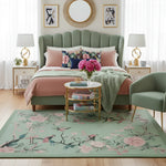 Decorative bedroom with floral green bird rug, bed, and side tables.