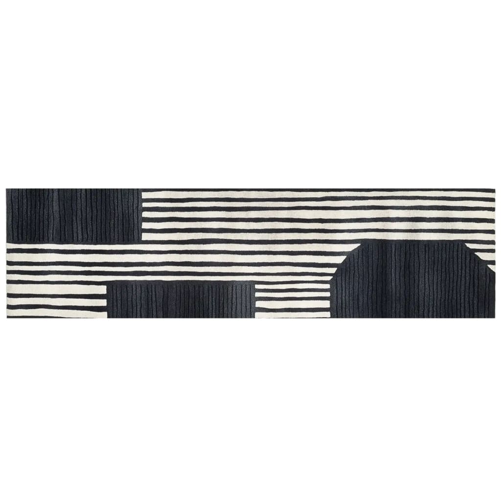 Top view of the Star Dance Hand Tufted Wool Rug showcasing a contemporary design with black and white geometric patterns. Ideal as a runner rug for hallways, kitchens, or bathrooms, this wool rug blends modern aesthetics with practical use.