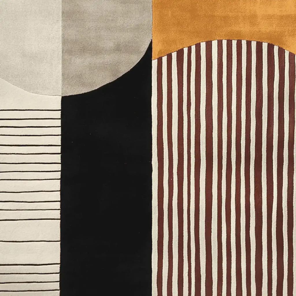 A contemporary area rug with a striking geometric design featuring blocks of black, beige, and mustard colors. The rug showcases a mix of straight and wavy stripes, perfect for adding a modern touch to large living rooms. Made from wool, this hand-tufted rug is ideal for those seeking stylish rugs for living room décor.