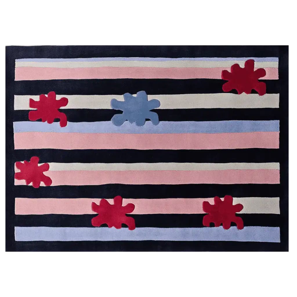 A vibrant hand-tufted area rug with bold black, pink, and blue stripes, accented by playful red and blue splat designs, perfect for adding a contemporary touch to your living room. This wool rug offers a unique blend of style and comfort, making it an ideal choice for living room area rugs.