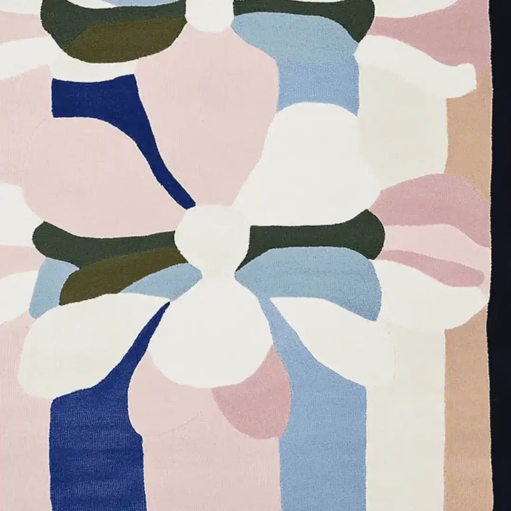 A beautiful structured drift plane hand tufted area rug featuring an abstract design with soft pink, blue, white, and olive tones. Perfect for adding a touch of modern elegance to your living room, this contemporary wool rug offers a plush texture ideal for cozy living spaces.