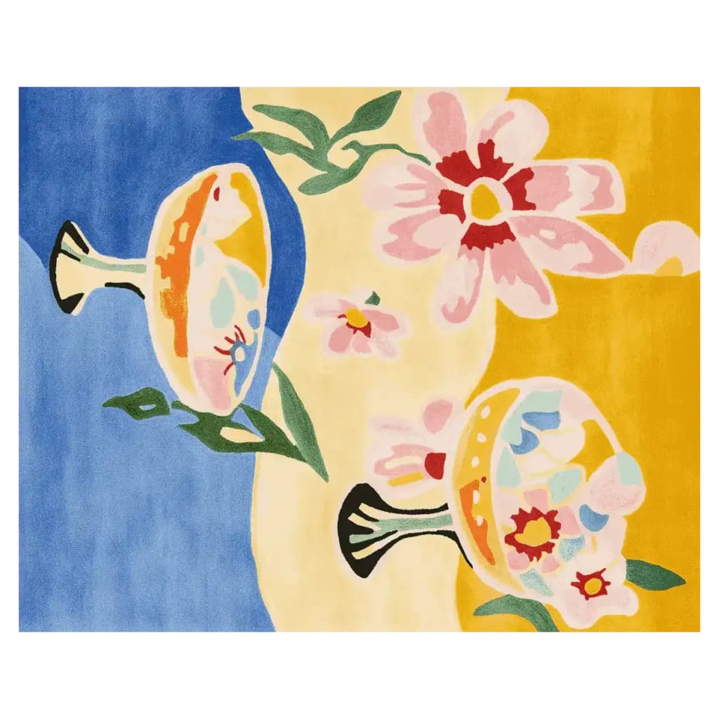 Vibrant hand-tufted wool area rug with a playful floral and goblet design, perfect for adding a contemporary touch to any living room. This colorful rug features bold hues of blue, yellow, and pink, making it an eye-catching centerpiece for area rugs in living rooms.
