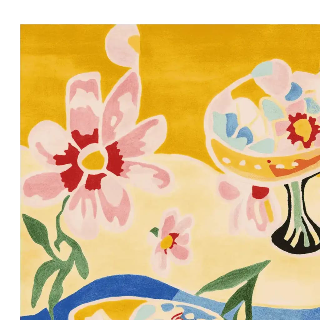 Bright and colorful hand tufted wool rug featuring a playful floral and abstract design against a vibrant yellow background. Perfect for adding a splash of color to any contemporary living room, this area rug brings a touch of modern artistry to your space.