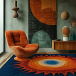 Blue and orange sunburst rug beneath a rust velvet lounge chair in a moody mid-century room