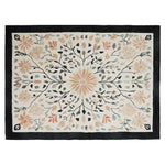 Sunlit Garden Hand Tufted Wool Rug featuring a vibrant floral design with branches and leaves. This elegant area rug is perfect for adding a touch of nature to your living room. The intricate pattern and warm colors make it an ideal choice for those seeking a high-quality wool rug.